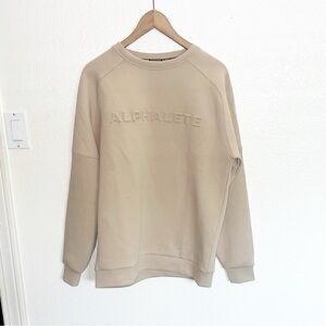 Alphalete men’s tan long sleeve embossed sweater FLAWED